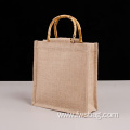 Strong inner pe coating natural hessian jute bag reusable stand-up function customize logo jute shopping bag with bamboo handle